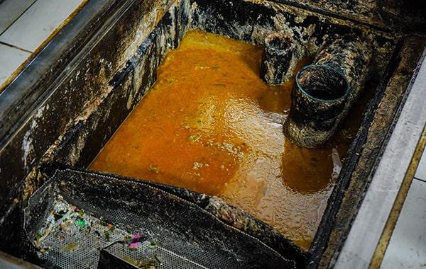 grease trap cleaning helps prevent grease and oil from entering the drain system, therefore reducing the risk of environmental contamination